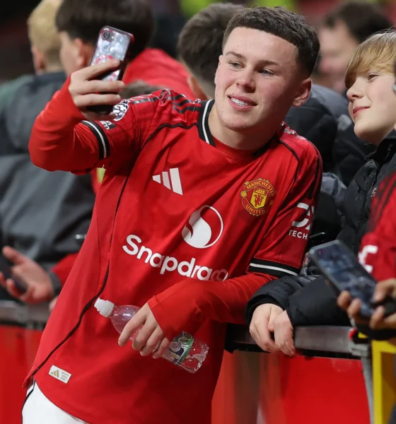 Wayne Rooney watching Kai Rooney play for Manchester United at Old Trafford
