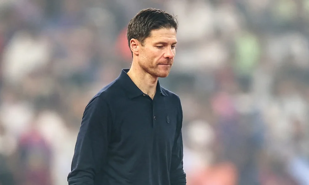 Xabi Alonso giving a press conference, expressing gratitude after Real Madrid dismissal