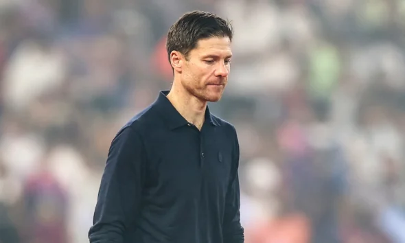 Xabi Alonso giving a press conference, expressing gratitude after Real Madrid dismissal