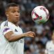 Kylian Mbappé injured on the sidelines as Álvaro Arbeloa watches during Real Madrid match
