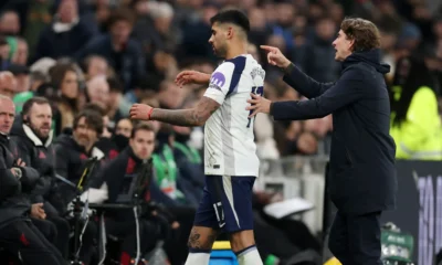 Cristian Romero captaining Tottenham during a Premier League match