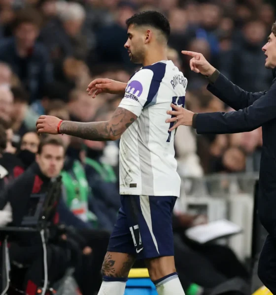Cristian Romero captaining Tottenham during a Premier League match