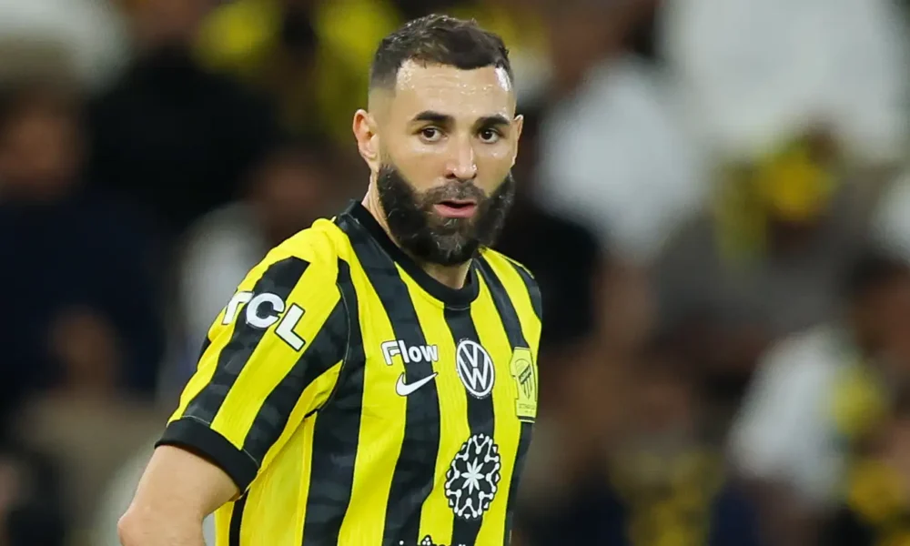 Karim Benzema in Al-Hilal training kit smiling after completing transfer from Al-Ittihad