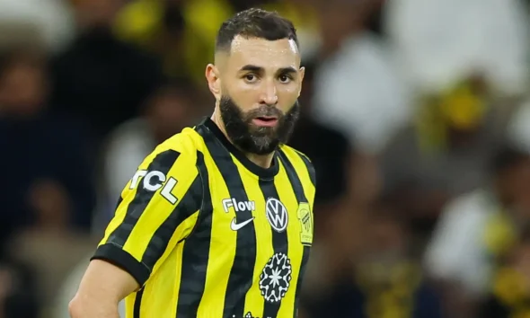 Karim Benzema in Al-Hilal training kit smiling after completing transfer from Al-Ittihad