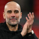 Pep Guardiola celebrates on the touchline during Manchester City’s comeback win over Liverpool at Anfield