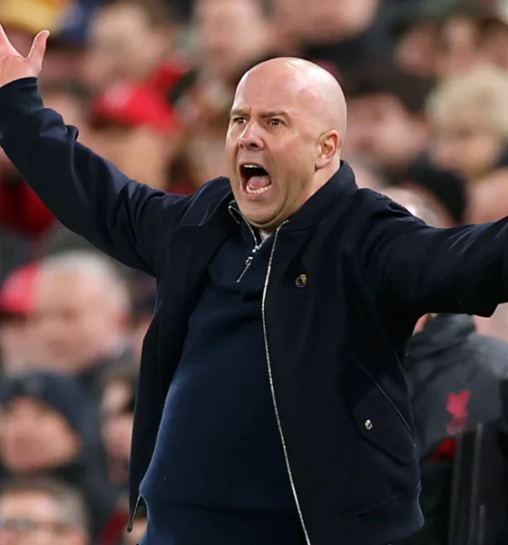 Roy Keane criticizes Manchester City for loud dressing room music disrupting Liverpool manager Arne Slot post-match interview at Anfield.