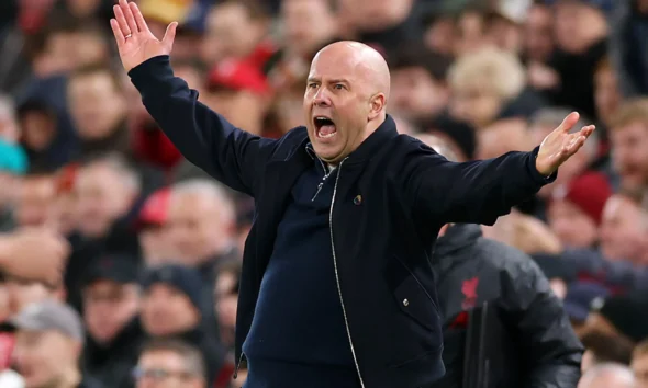 Roy Keane criticizes Manchester City for loud dressing room music disrupting Liverpool manager Arne Slot post-match interview at Anfield.