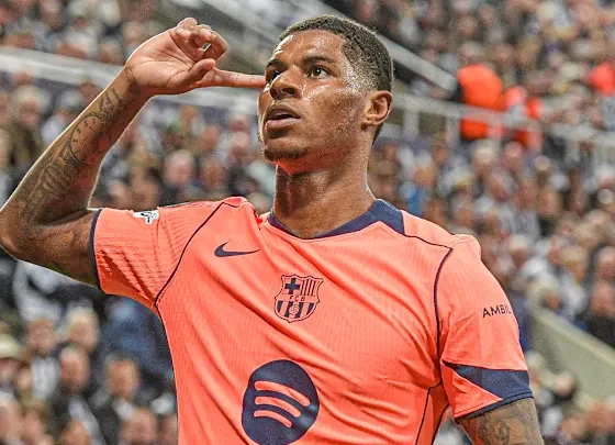 marcus rashford celebrating goal for barcelona at camp nou