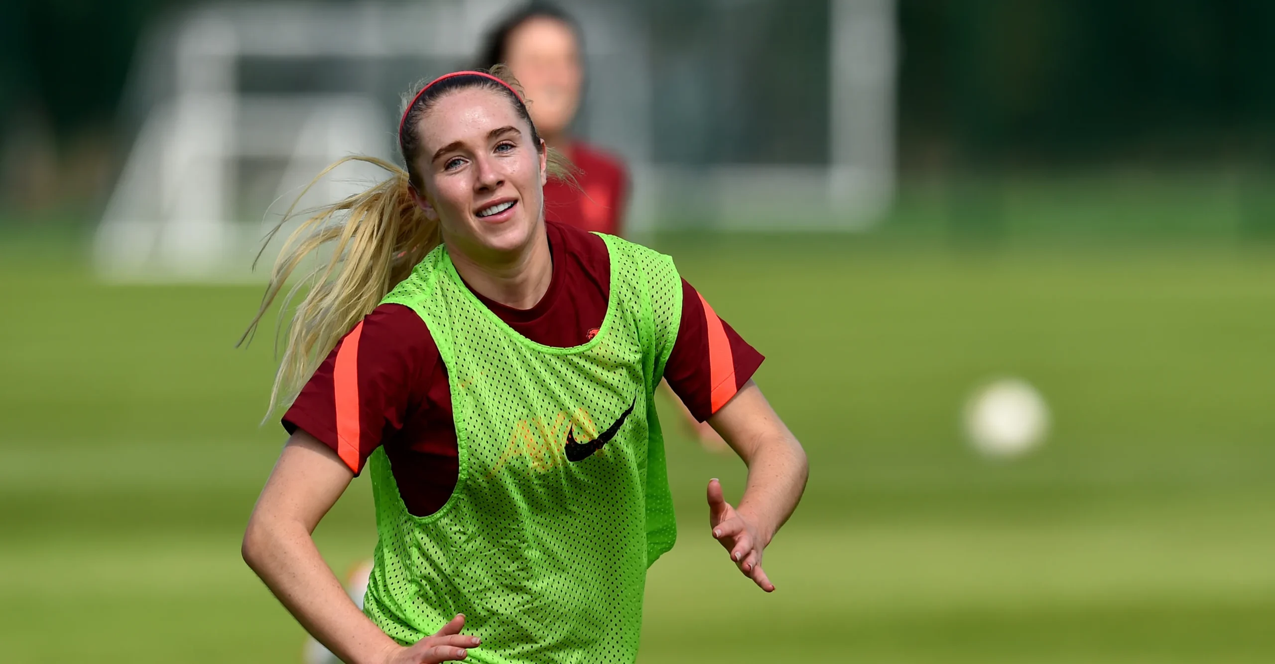 Missy Bo Kearns smiling during an England training session