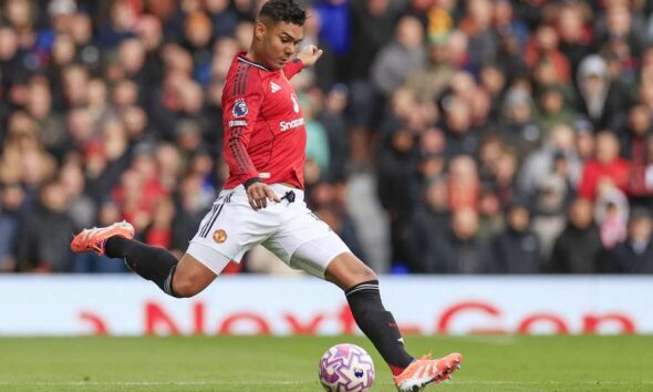 Casemiro in action for Manchester United during a Premier League match at Old Trafford