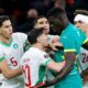 Senegal national team celebrating with fans amid AFCON controversy over Morocco decision