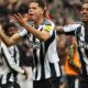 William Osula celebrating after scoring for Newcastle against Manchester United
