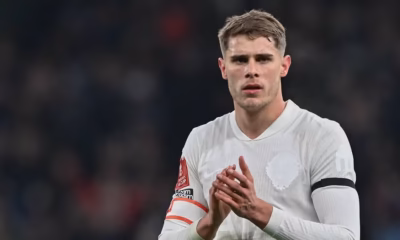 Micky van de Ven in action for Tottenham during Premier League match amid Manchester United and Liverpool transfer interest.