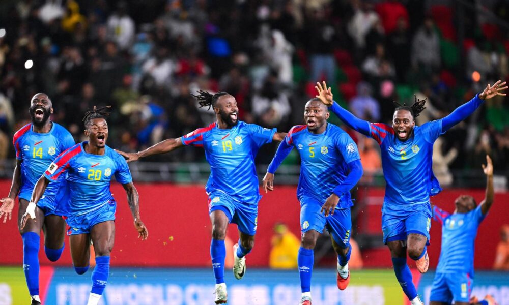 DR Congo players celebrating World Cup qualification after defeating Jamaica