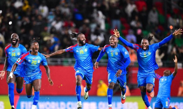 DR Congo players celebrating World Cup qualification after defeating Jamaica