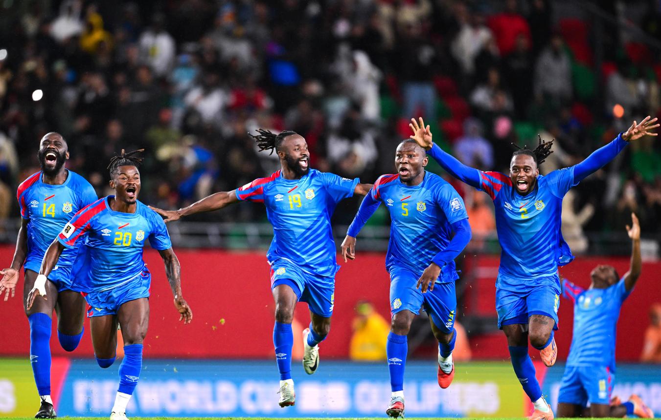 DR Congo players celebrating World Cup qualification after defeating Jamaica