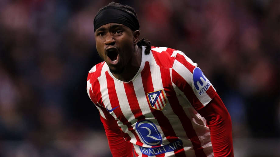 Ademola Lookman in action for Atletico Madrid showing defensive effort and attacking skill.