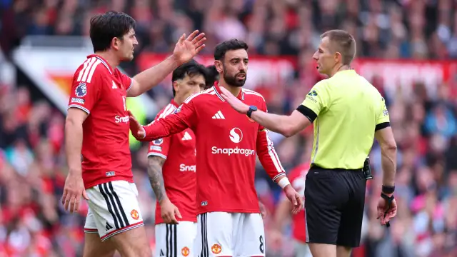 Roy Keane reacting angrily while discussing Bruno Fernandes and Manchester United.