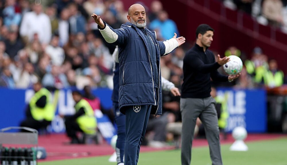 West Ham players protesting after a late goal was disallowed against Arsenal following a VAR review.