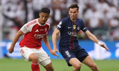 William Saliba during an Arsenal match amid concerns over a lingering back injury.