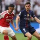 William Saliba during an Arsenal match amid concerns over a lingering back injury.
