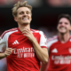 Martin Odegaard celebrates after scoring Arsenal’s winning goal against Chelsea in the Premier League